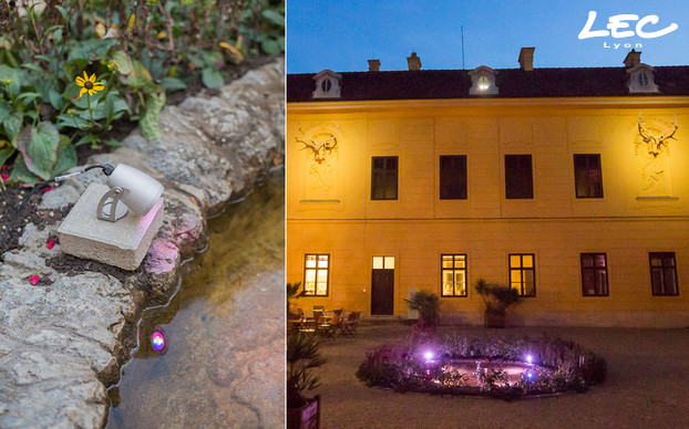 <p>4 <strong>Luminy 2-4020 projectors in RGBW</strong> with a 36° lens light the fontain placed in the middle of the courtyard. They are placed on the raised circular edge of the fountain.</p>

<p>These luminaires are assigned to <strong>DALI technology</strong> and can be dimmed from a laptop or a smartphone. </p>
